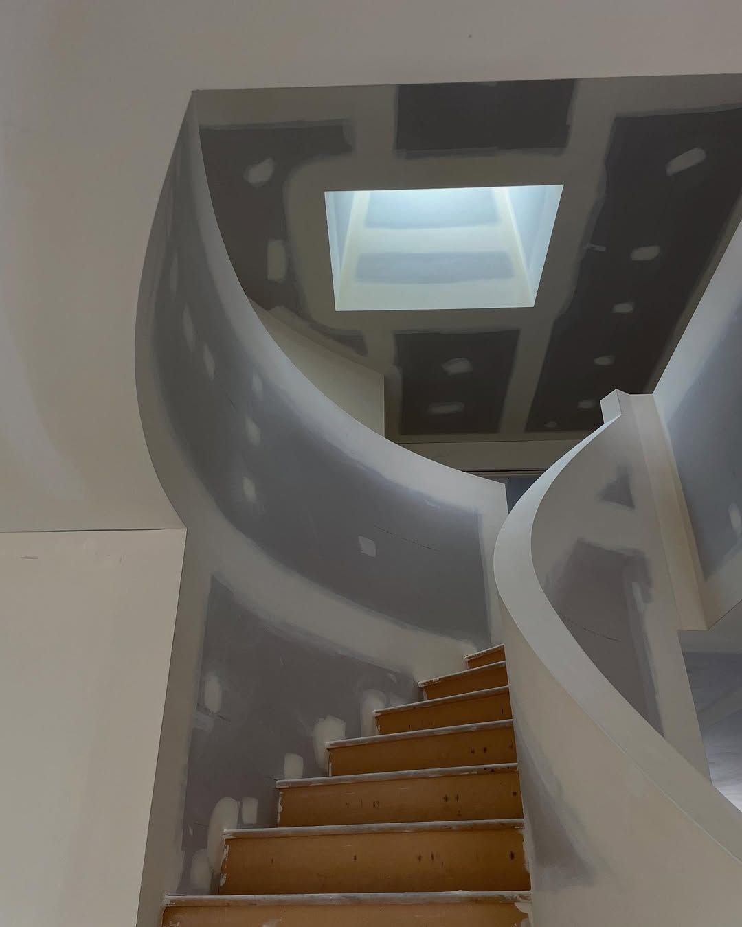 Curve staircase with gyprock setting finish. Sheeted high end finish Booker Bay NSW