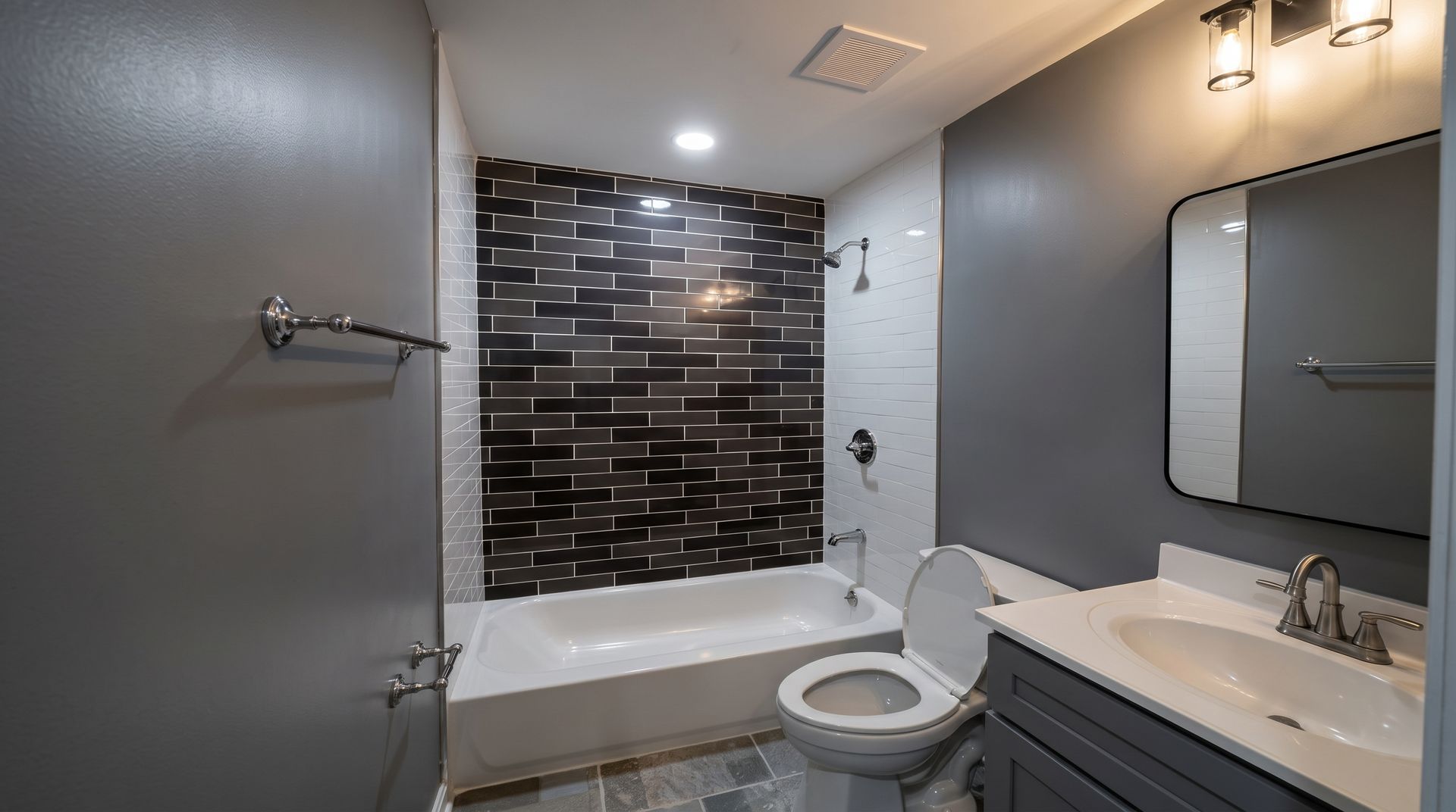 Bathroom with a modern toilet, gray walls, white shelves, and a blue-lit toilet bowl.