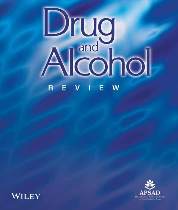 The cover of the Drug and Alcohol Review journal, featuring the title in blue text over an abstract blue water background.