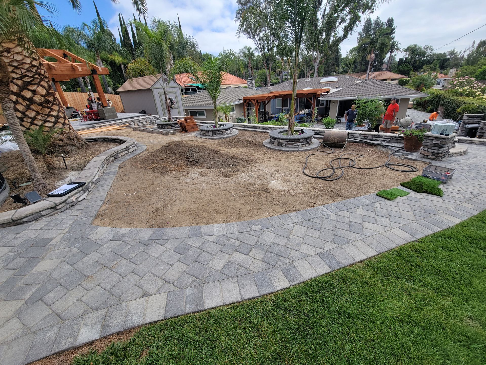 Before putting green install around planters