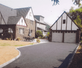 Driveway sealcoating.