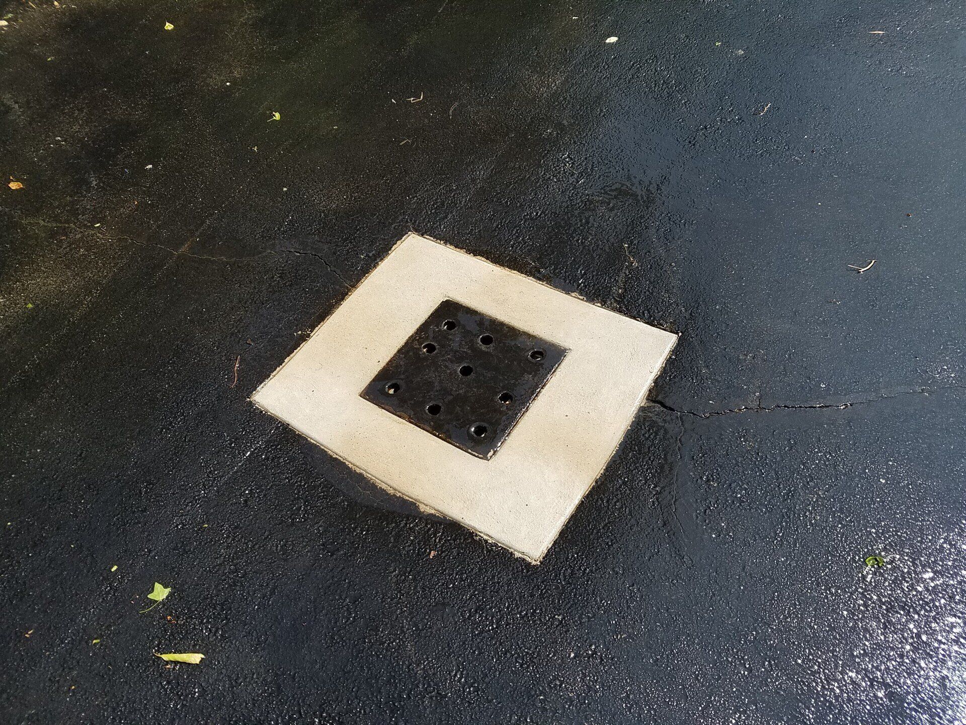Drain and sealcoating.