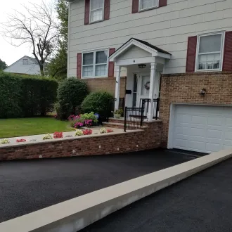 Asphalt driveway by Micciche Construction, Bloomfield, NJ.