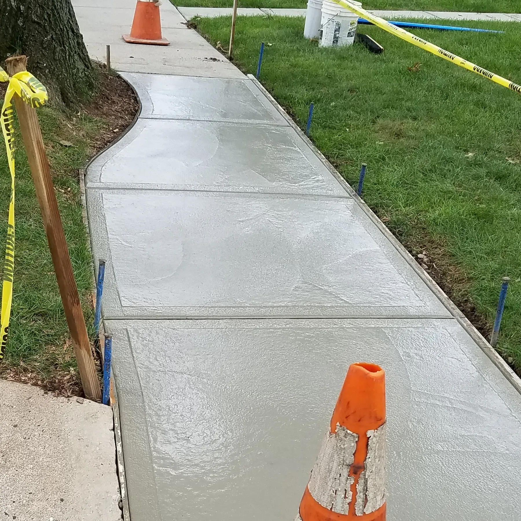 After image of concrete sidewalk by Micciche Construction.