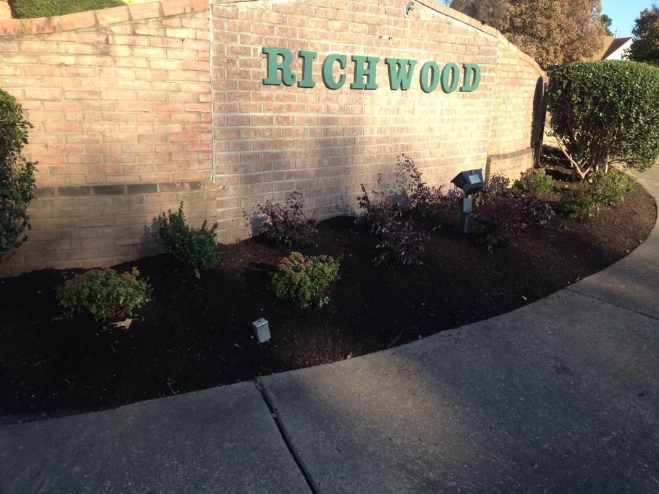 A brick wall with the word richwood on it