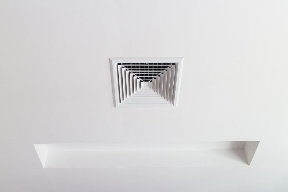 A White Square Air Vent On A White Ceiling — PalmAir Heating & Cooling Specialists In Wagga Wagga, NSW
