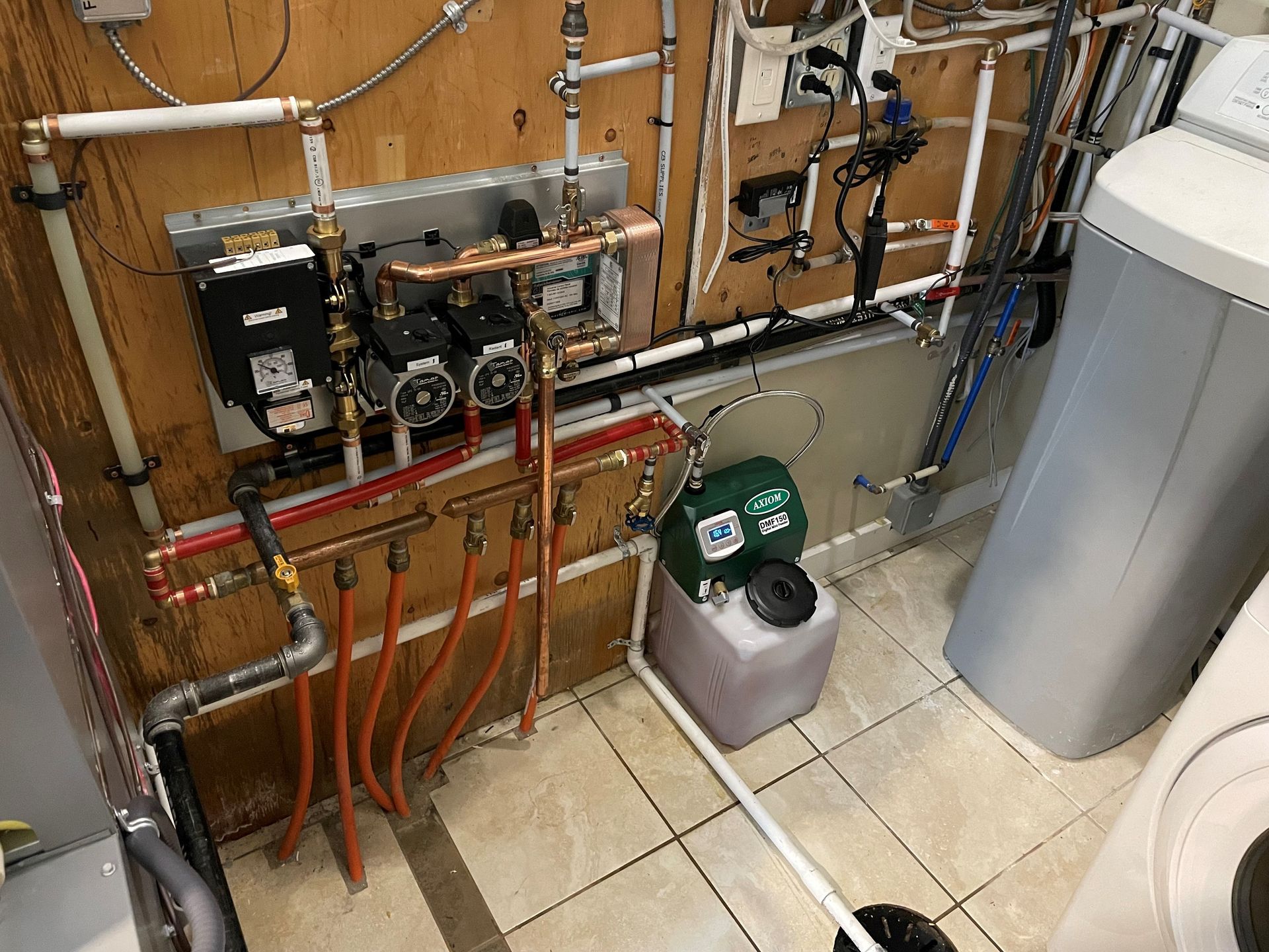 Winter Comfort Assured: Expert Boiler Repair Services in Okotoks - View of connections to a boiler