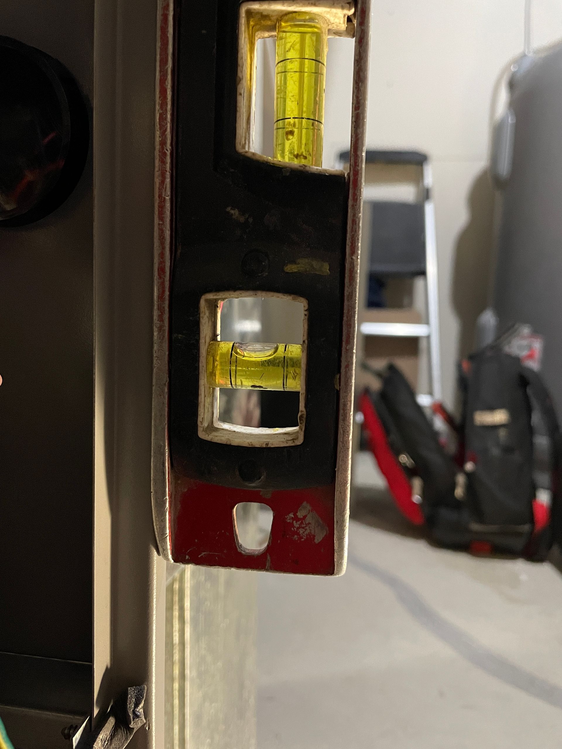 A picture of a Level against an appliance