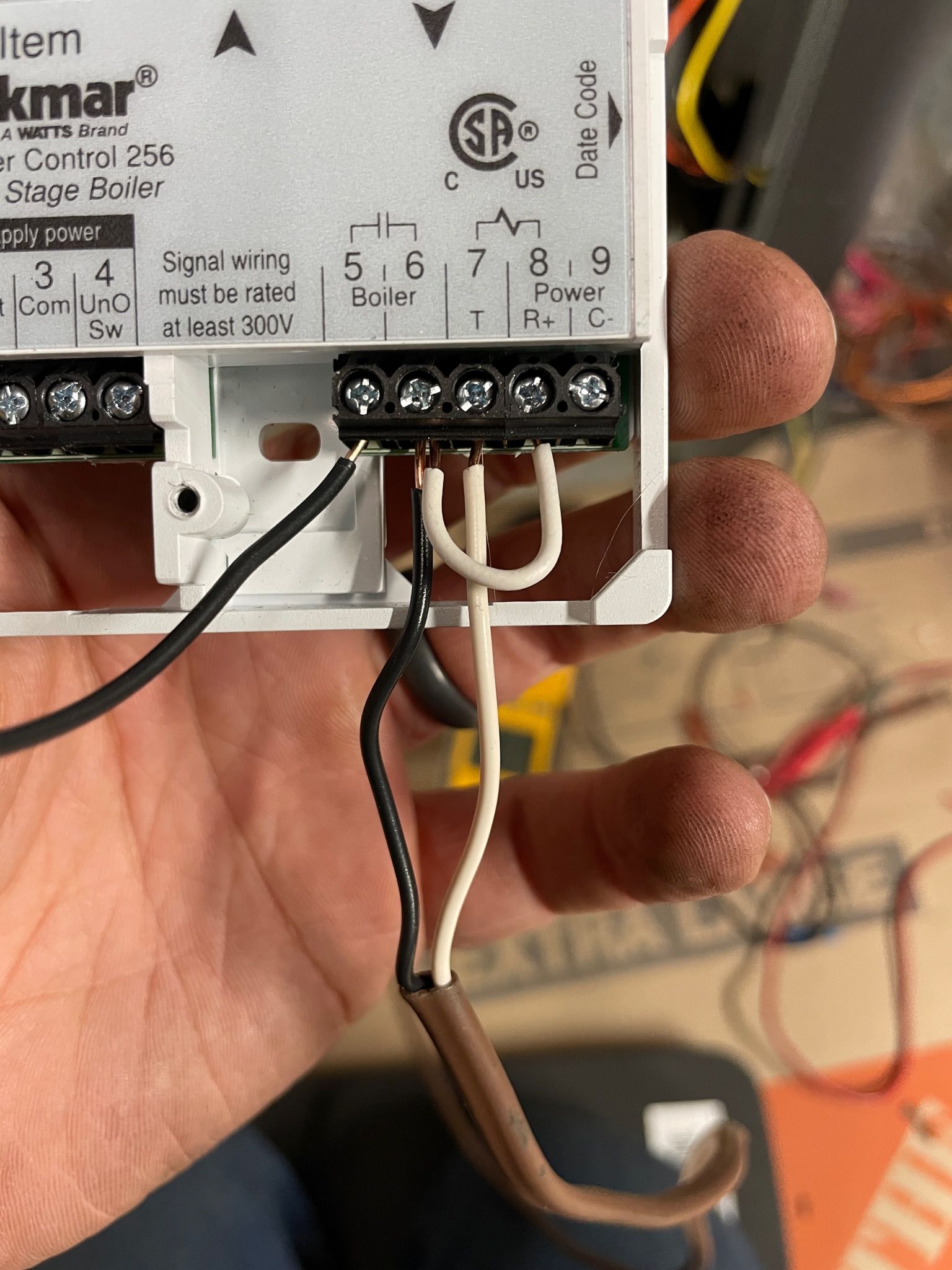 Expert Boiler replacement Services in Okotoks -Plumber fixing a boiler