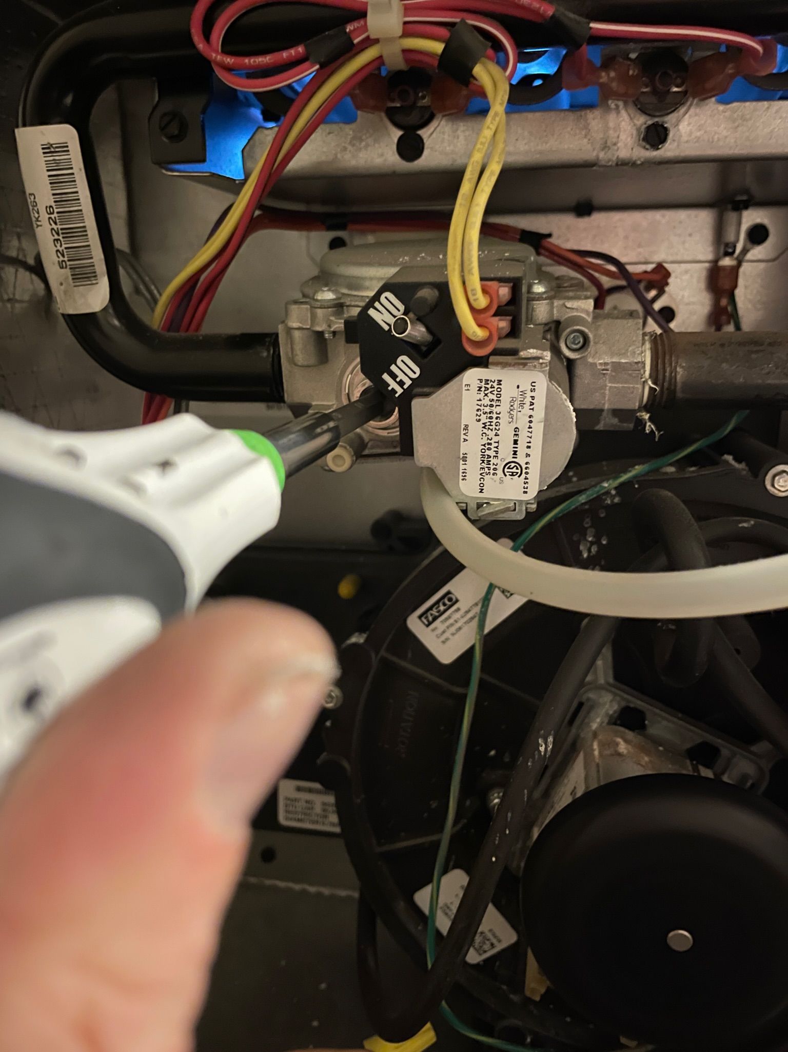 Technician working on furnace wiring