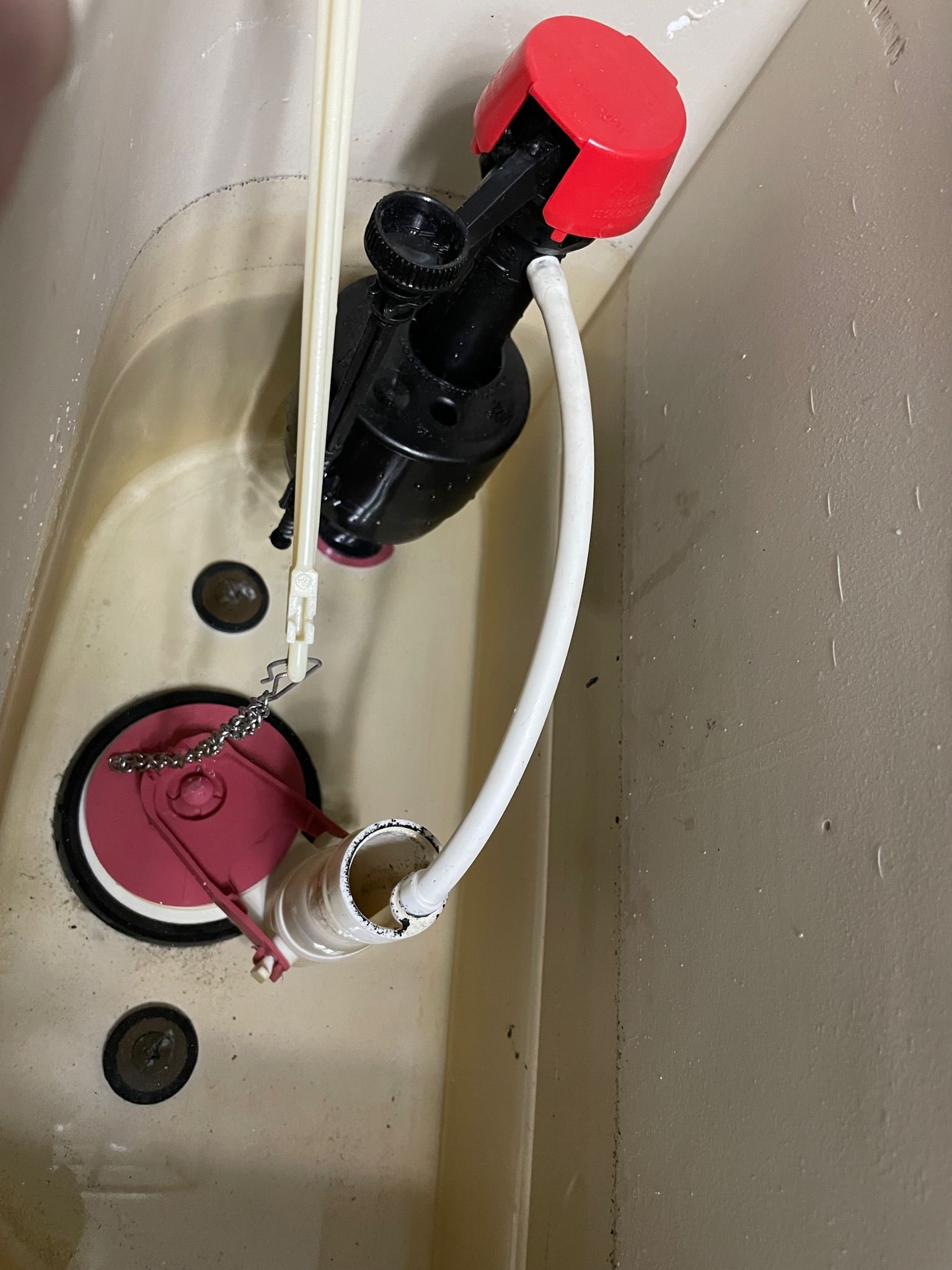 The Importance of Prompt Plumbing Repairs - the inside parts of a toilet tank