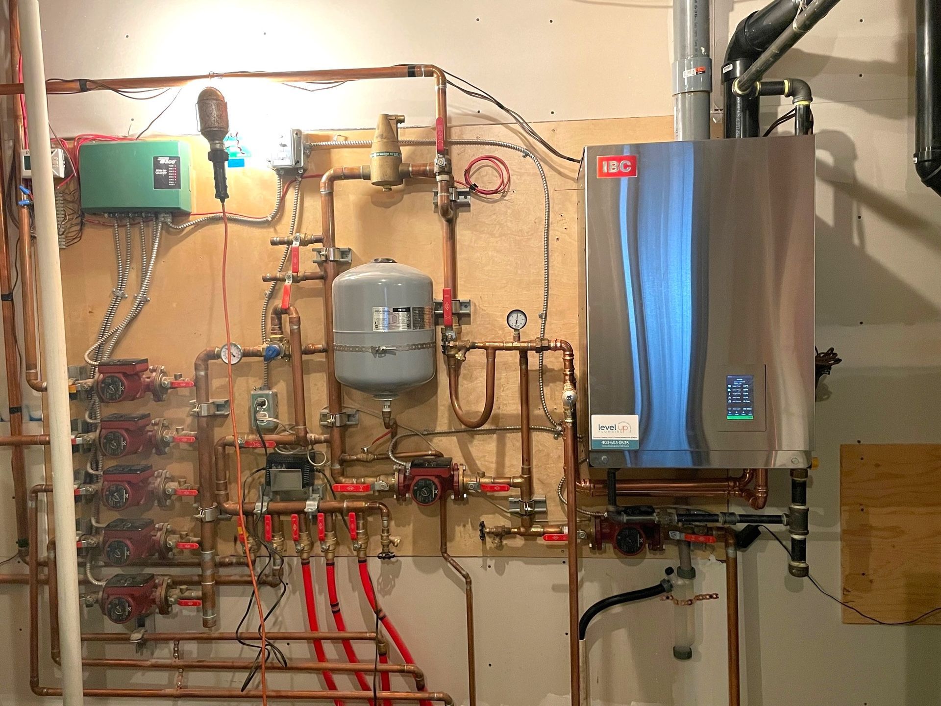 Winter Comfort Assured: Expert Boiler Repair Services in Okotoks - A boiler system in Okotoks