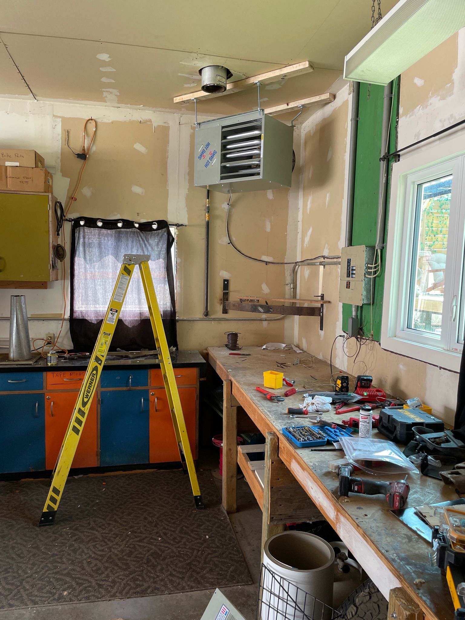 A garage heater installed in a garage workshop in Okotoks