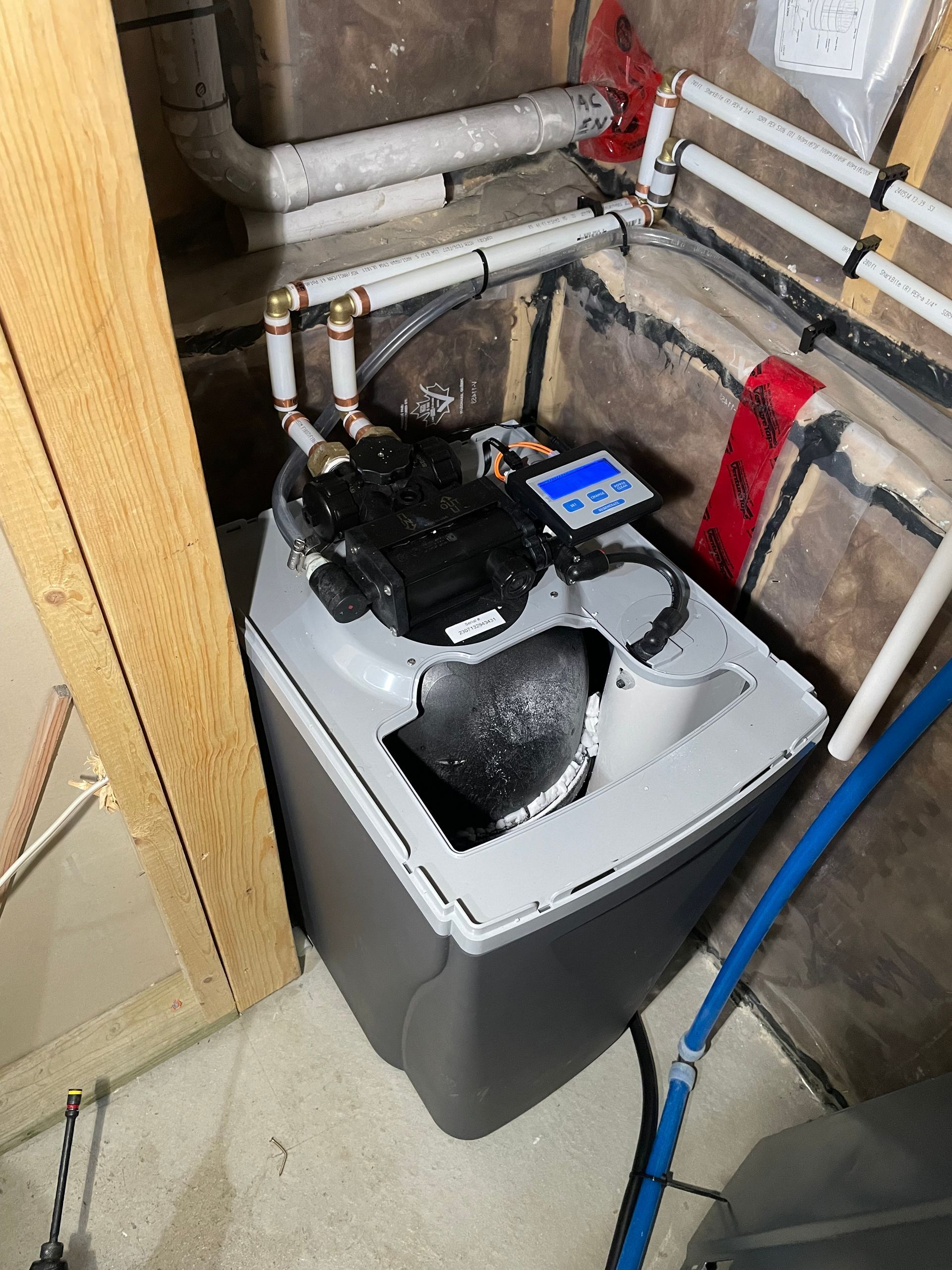 A picture of a water softener installed by Level Up