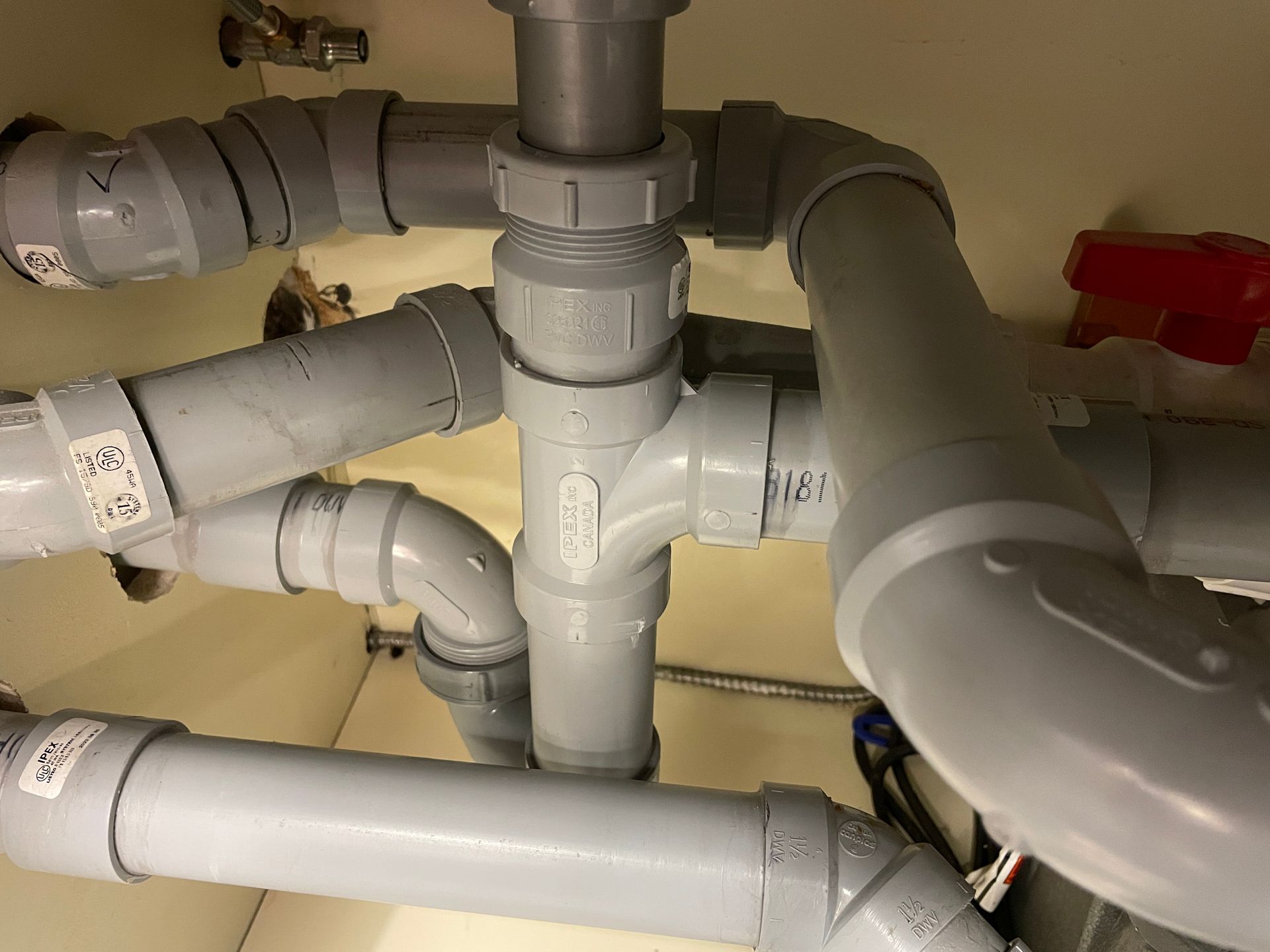 Complex piping completed by Level Up for a commercial grease interceptor