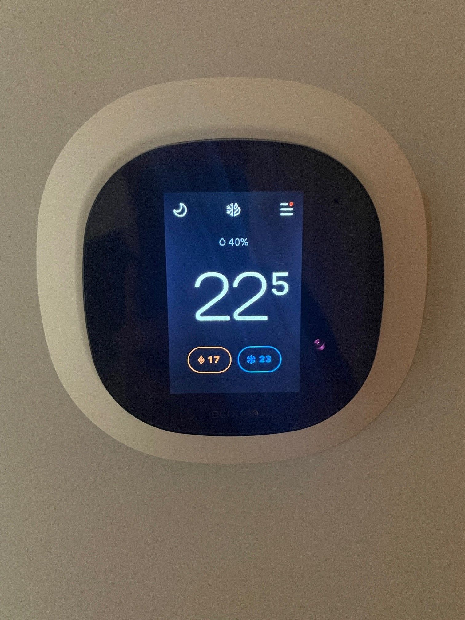 Our Heating Services - A picture of a digital thermostat for forced air furnace heating control