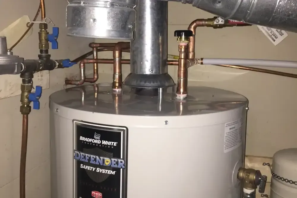 A water heater with venting and water connections