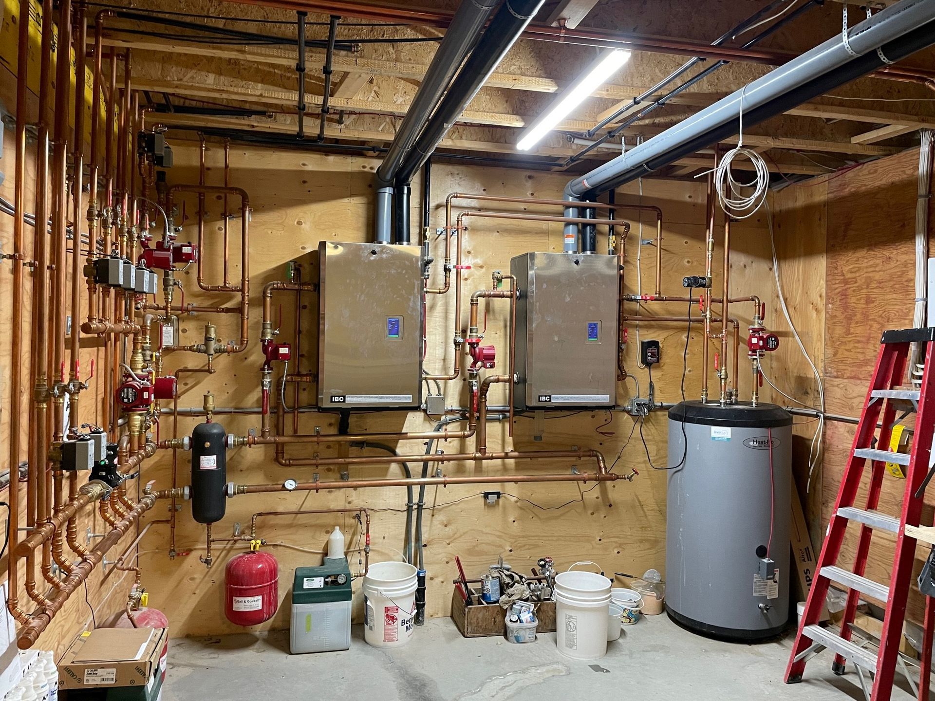 A complex boiler system in a mechanical room in Okotoks