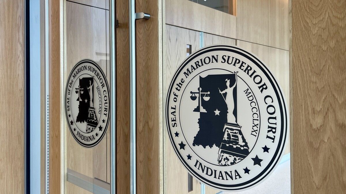 The indiana superior court seal is on a glass door