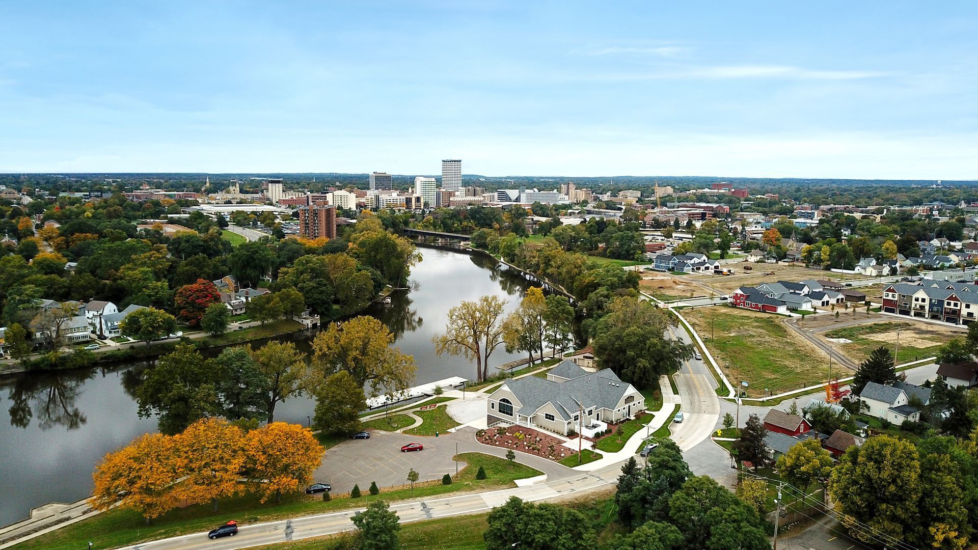 An aerial view of a city with a river running through it
