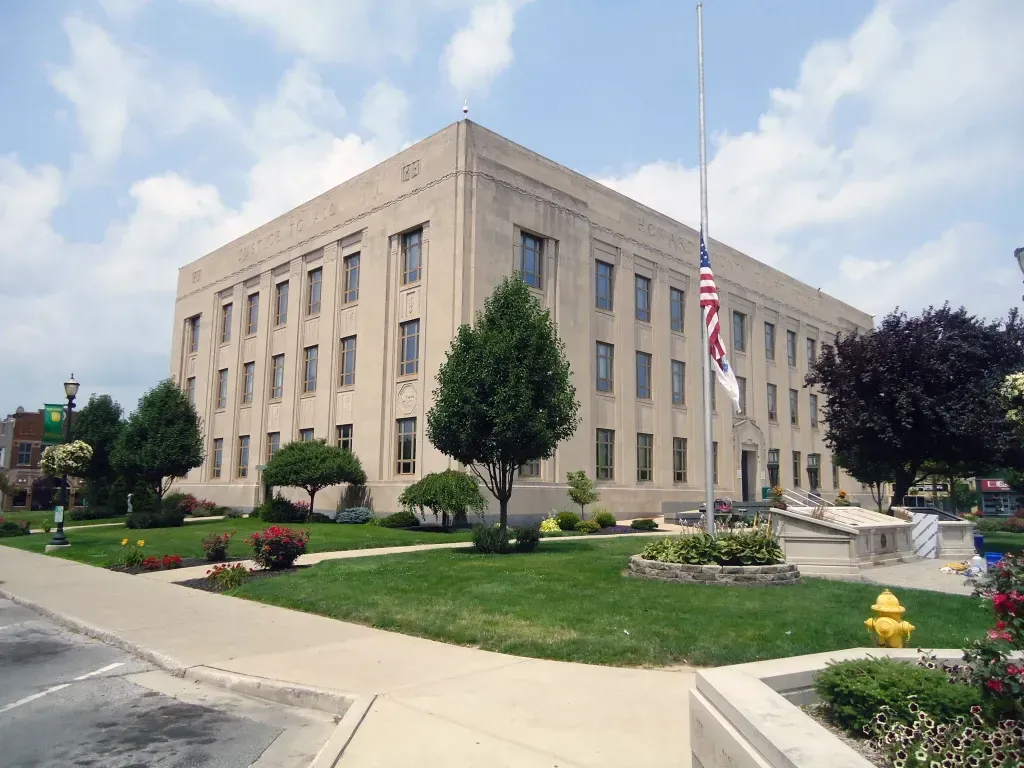 A large building with a fire hydrant in front of it
