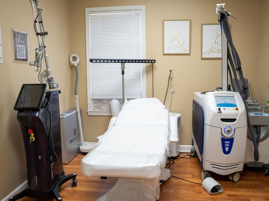 A woman is getting a facial treatment at a spa.
