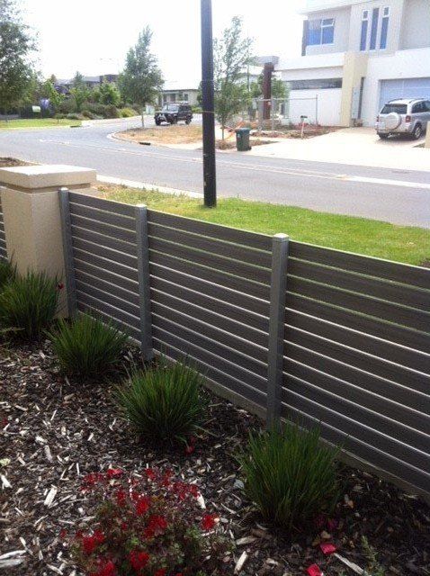 A fence with grass and bushes | Roseworthy, SA | Bazza's Fencing
