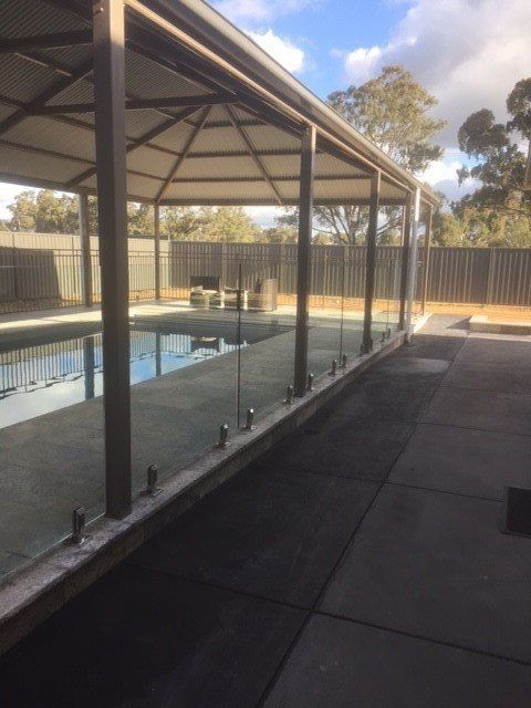A pool with a covered patio | Roseworthy, SA | Bazza's Fencing
