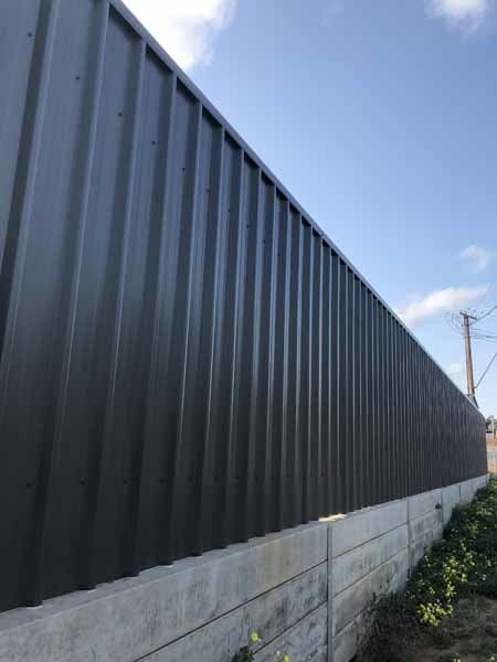 A black metal fence with concrete base | Roseworthy, SA | Bazza's Fencing