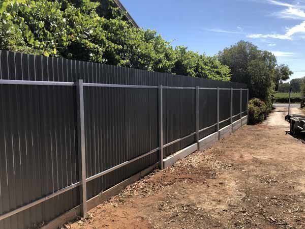 A fence next to a dirt road | Roseworthy, SA | Bazza's Fencing