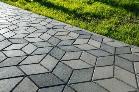 Stunning dual toned stamped concrete surface installed by the expert concrete contractor in Cranbourne VIC.