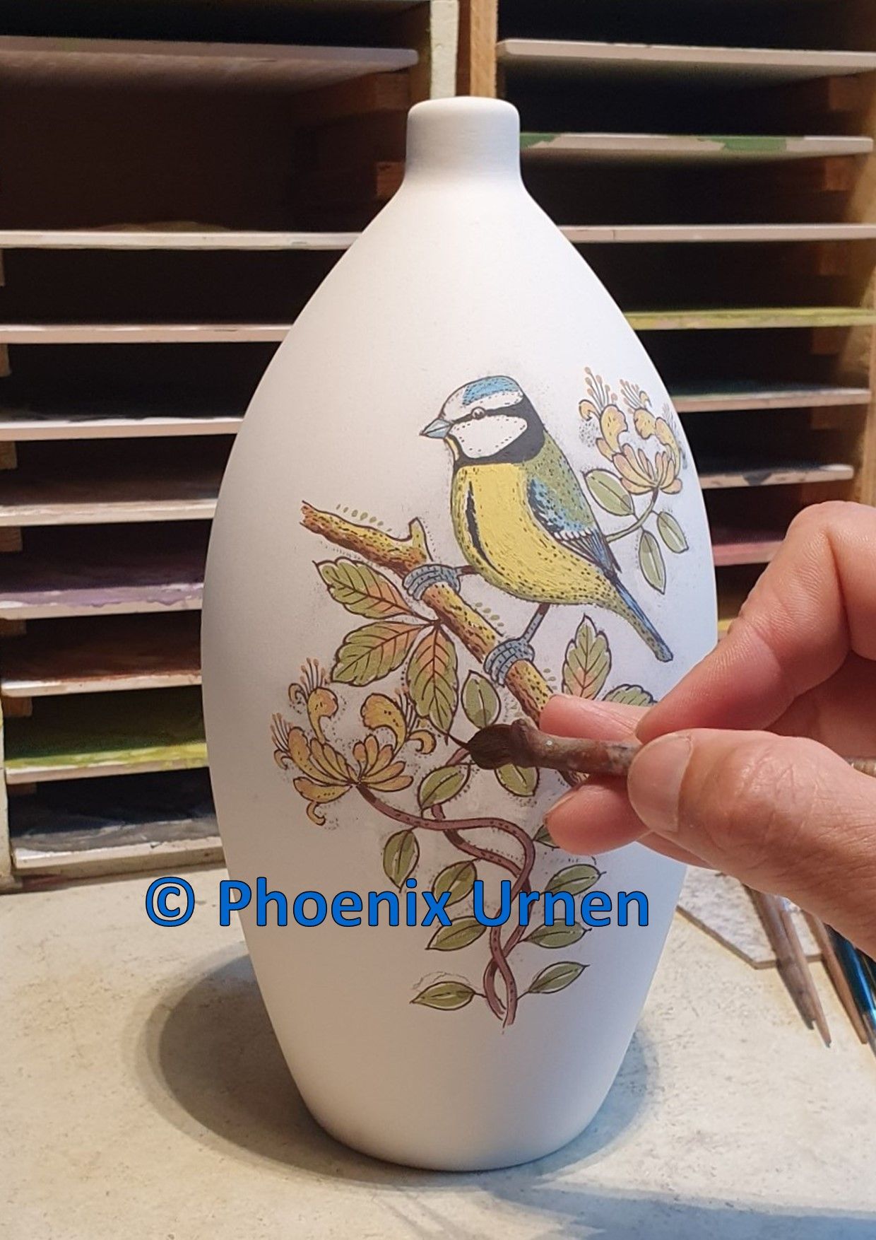 Painting process urn Blue Tit