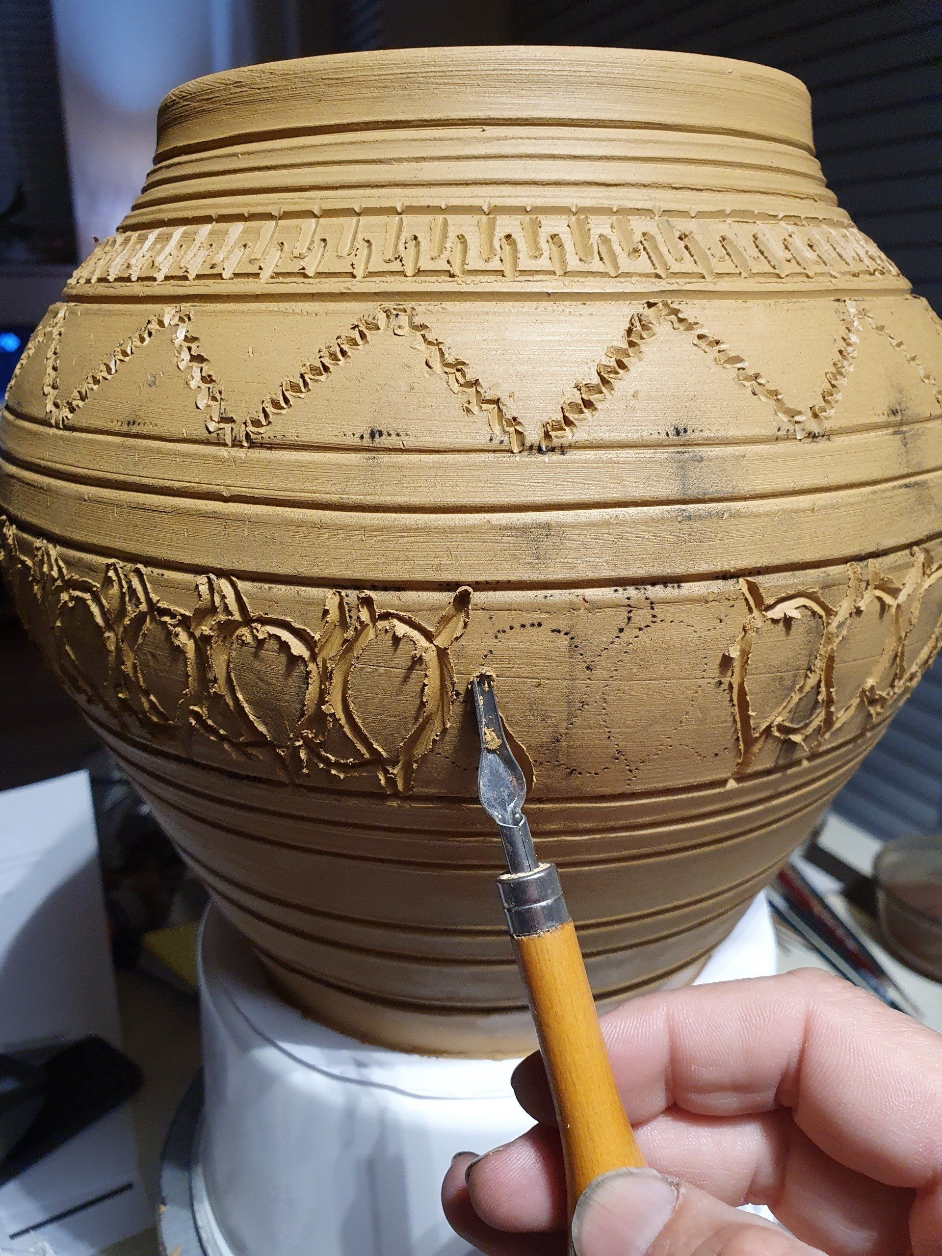 Urn met oeroude indianenmotieven