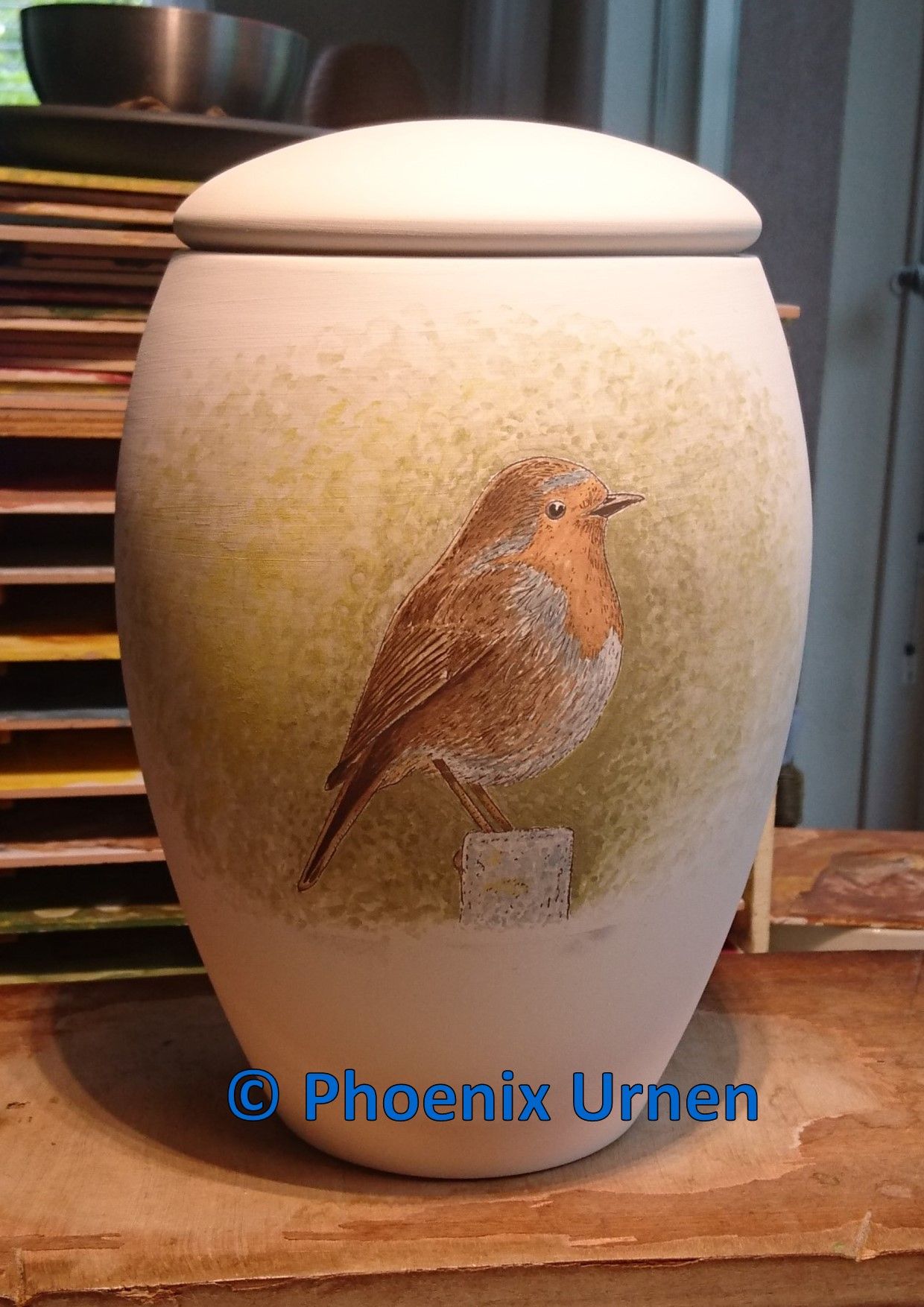 Urn Robin painted after the funeral card picture