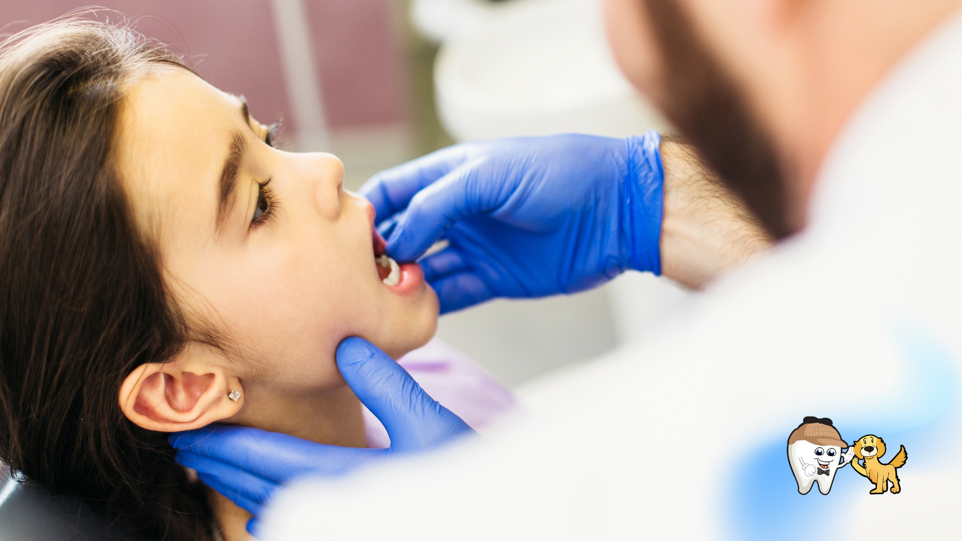A young girl is sitting in a dental chair while a dentist examines her teeth.