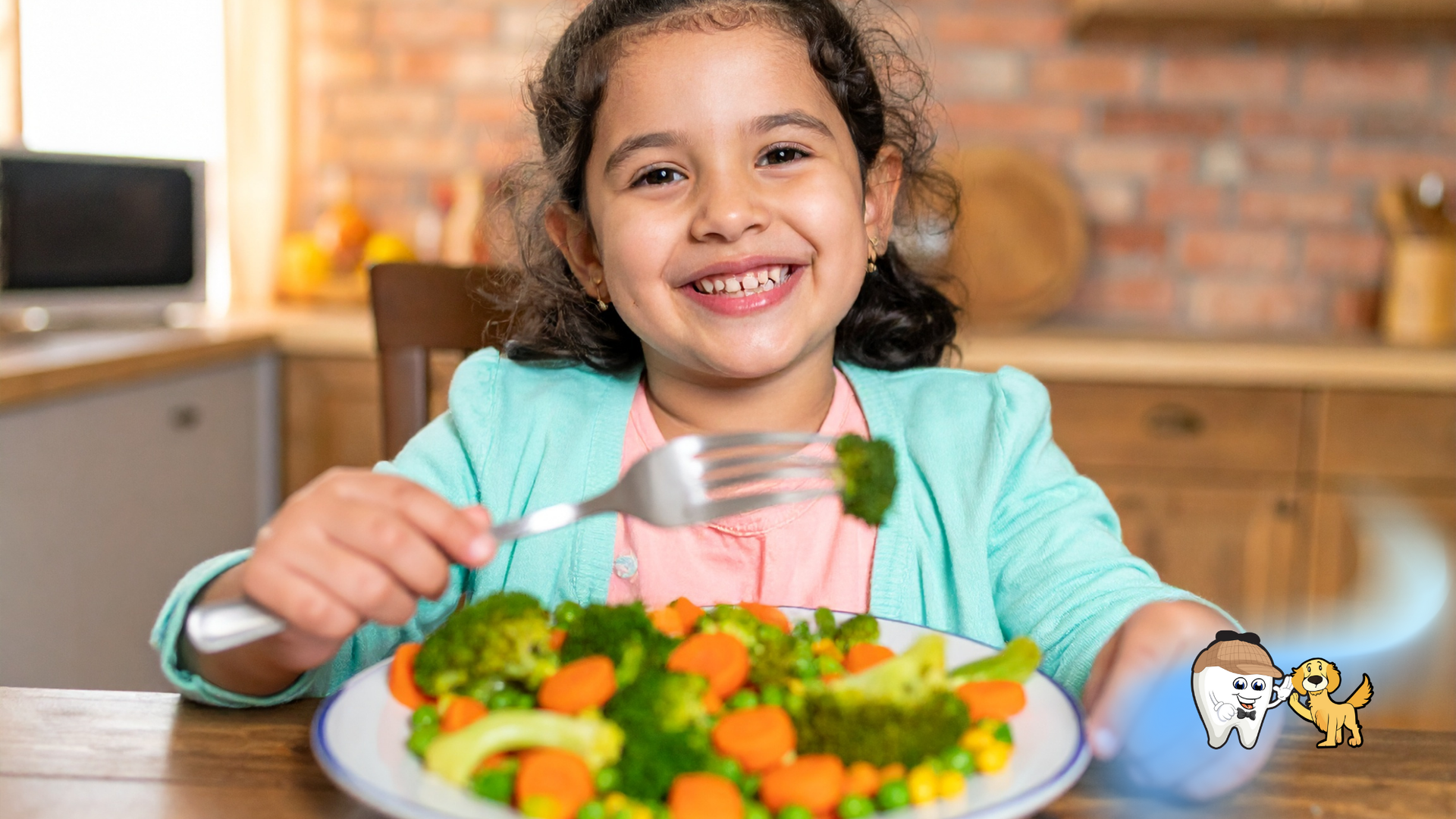 Girl smiling, eating broccoli from a plate of vegetables in a kitchen.