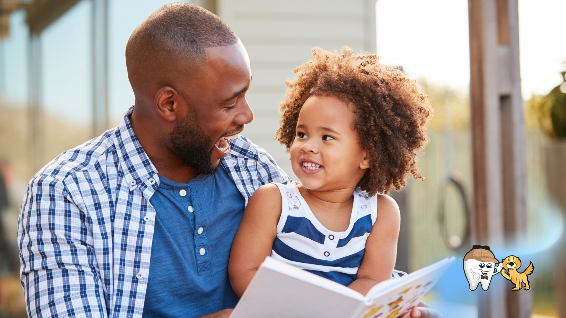 A man is reading a book to a little girl.