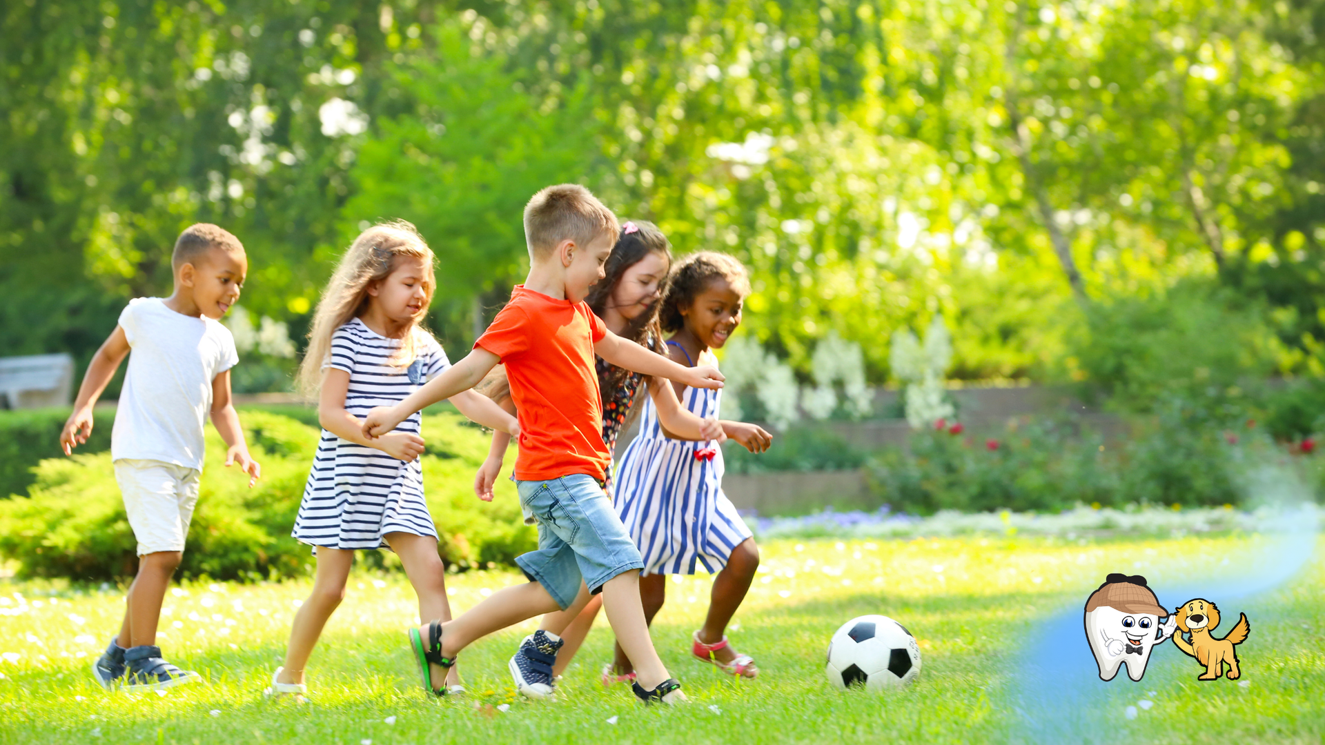 Children playing soccer on a grassy field in sunlight.