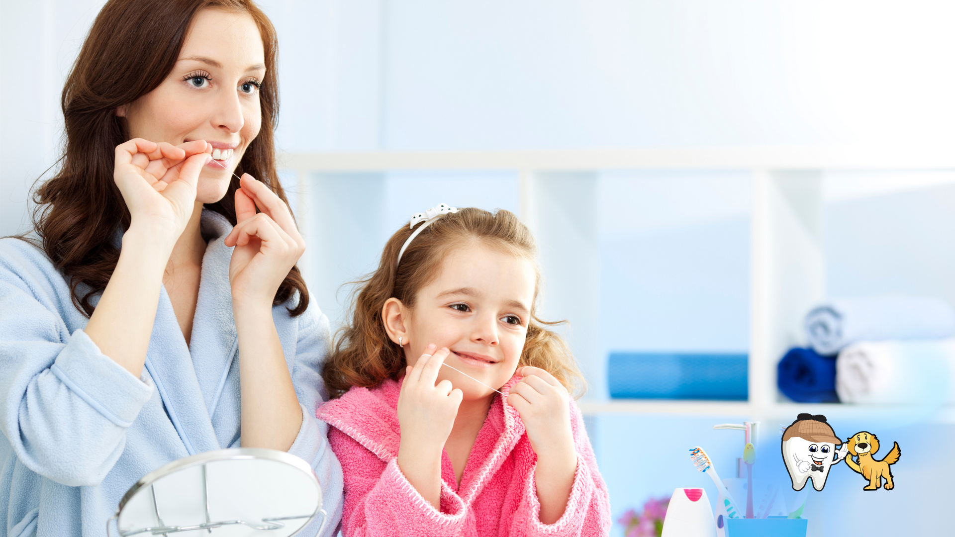 A woman and a little girl are brushing their teeth in a bathroom.