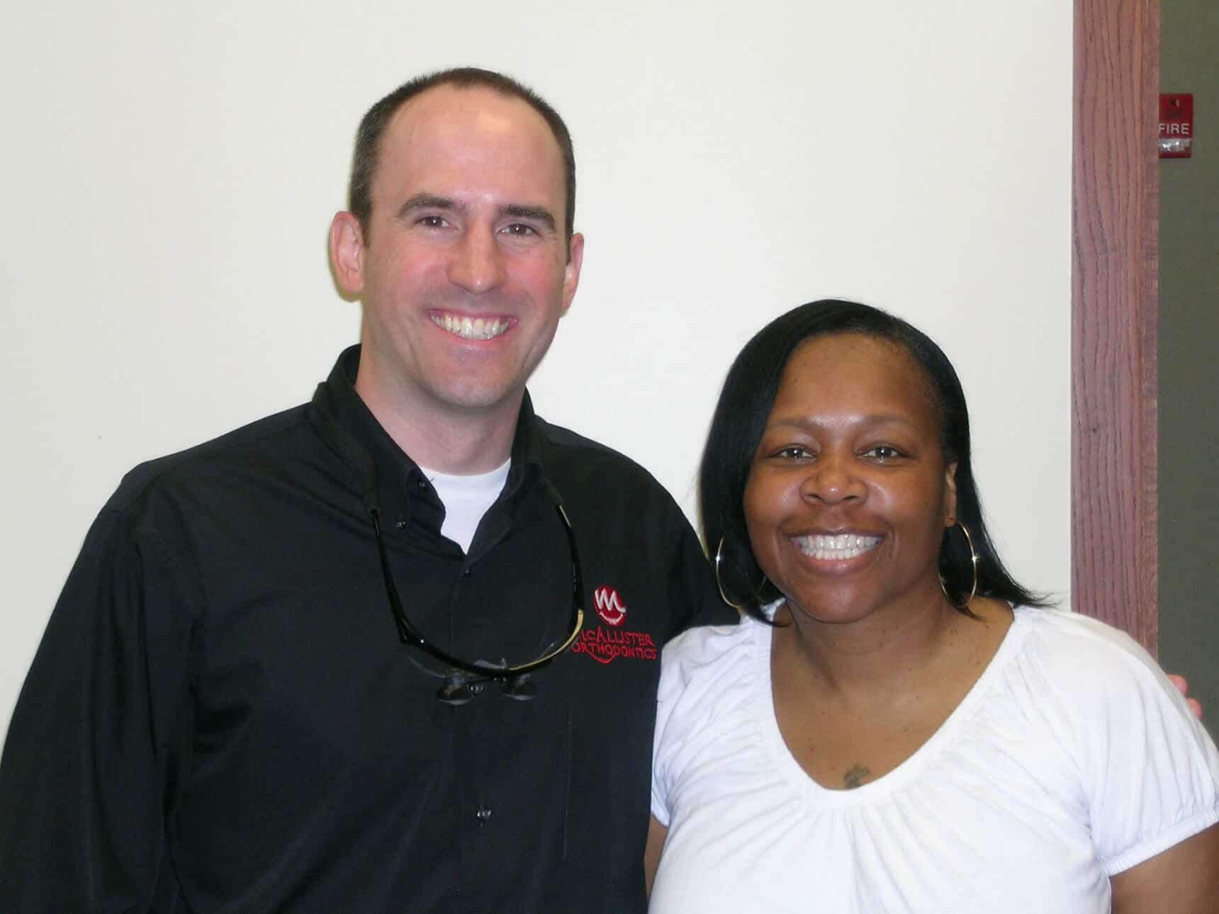 A man and a woman are posing for a picture together