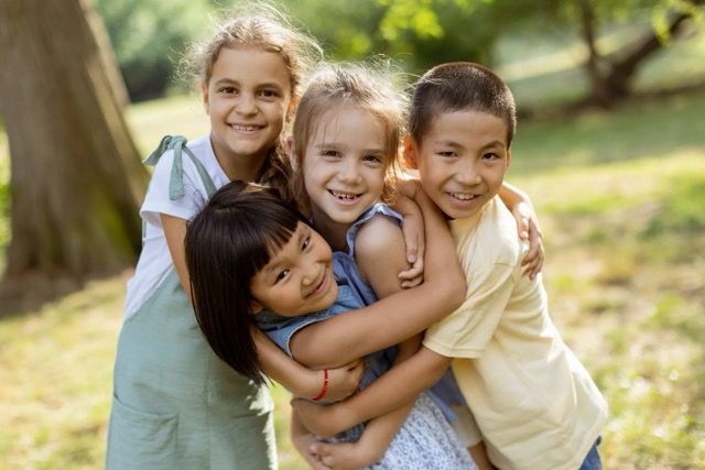 children hugging each other