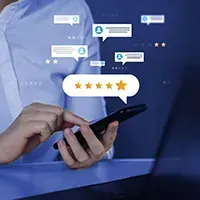 reviews Hand using smartphone with floating chat bubbles and star ratings on a blue background