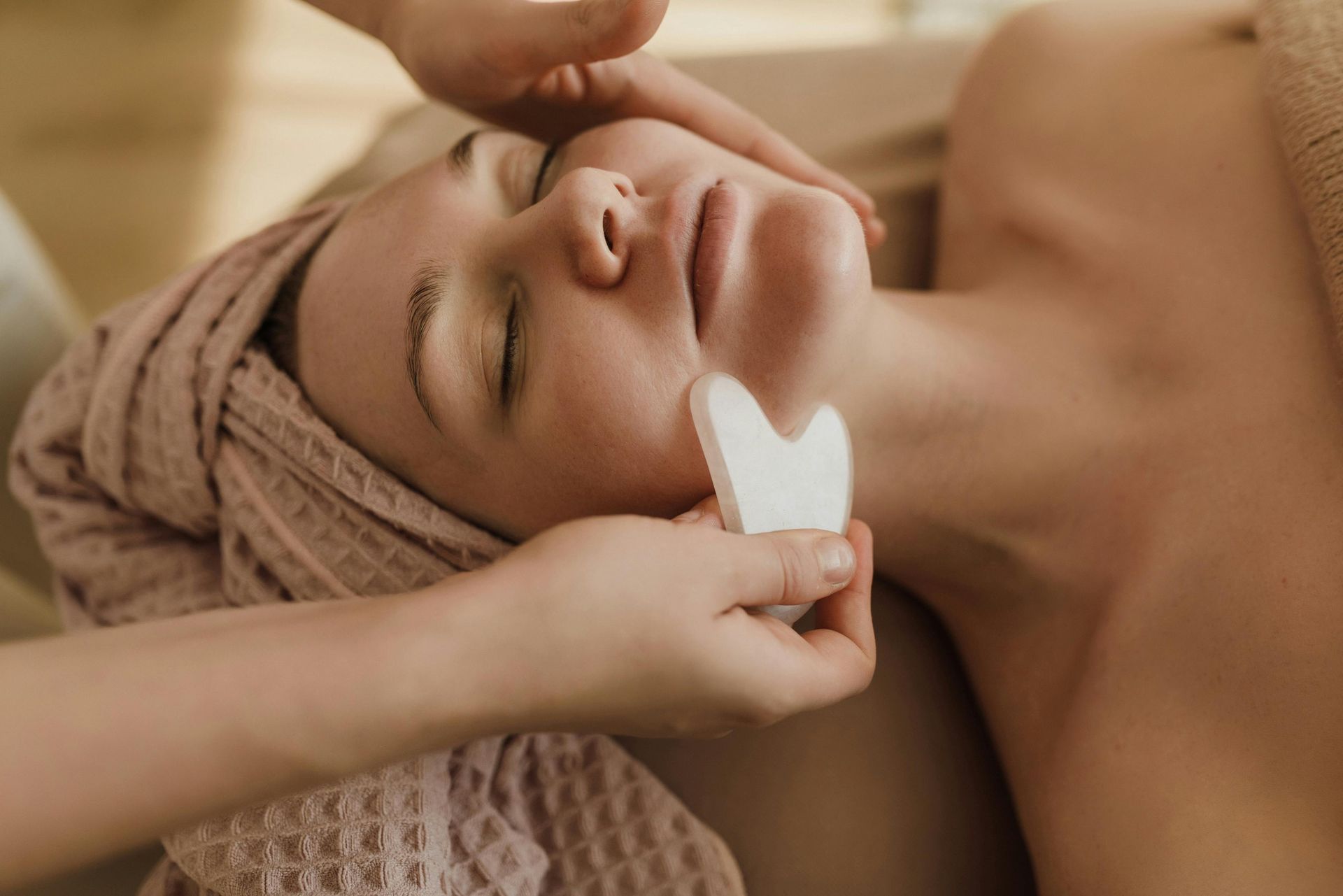 Person Receiving Facial Treatment — Penelope's Beauty in Medowie, NSW