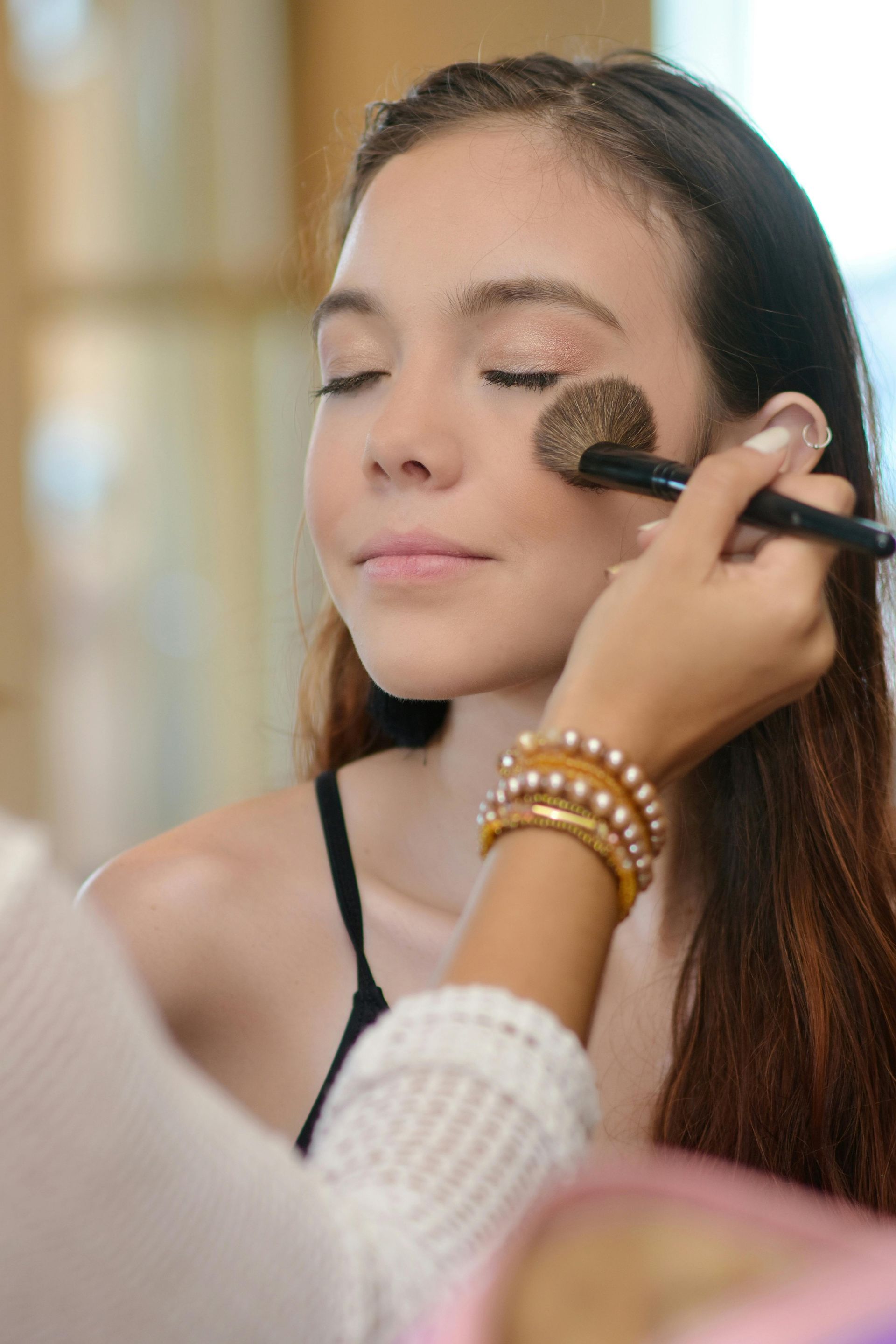 A Woman Getting Her Brows Done In A Salon — Penelope's Beauty in Medowie, NSW