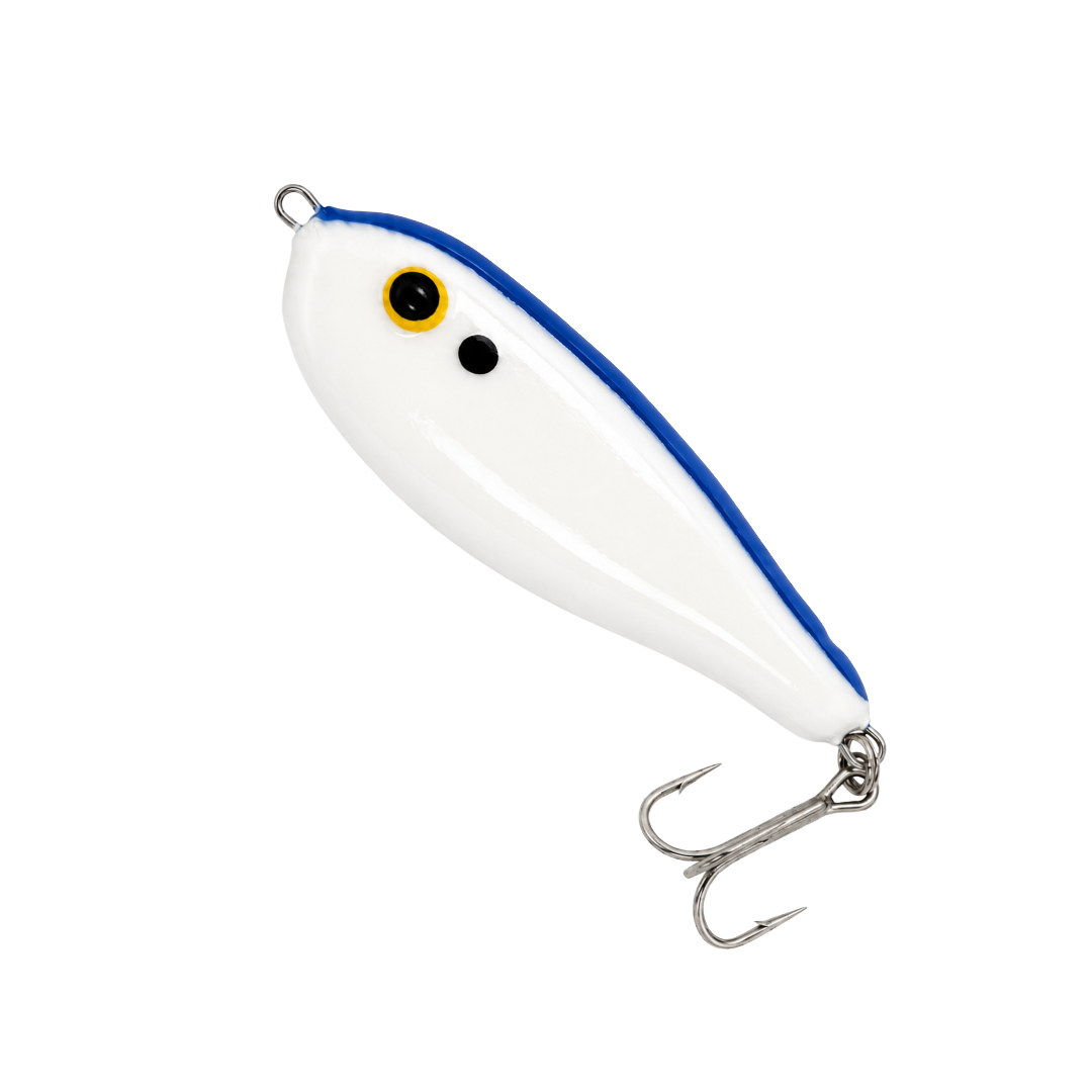 White fishing lure with blue trim and treble hook on a plain background