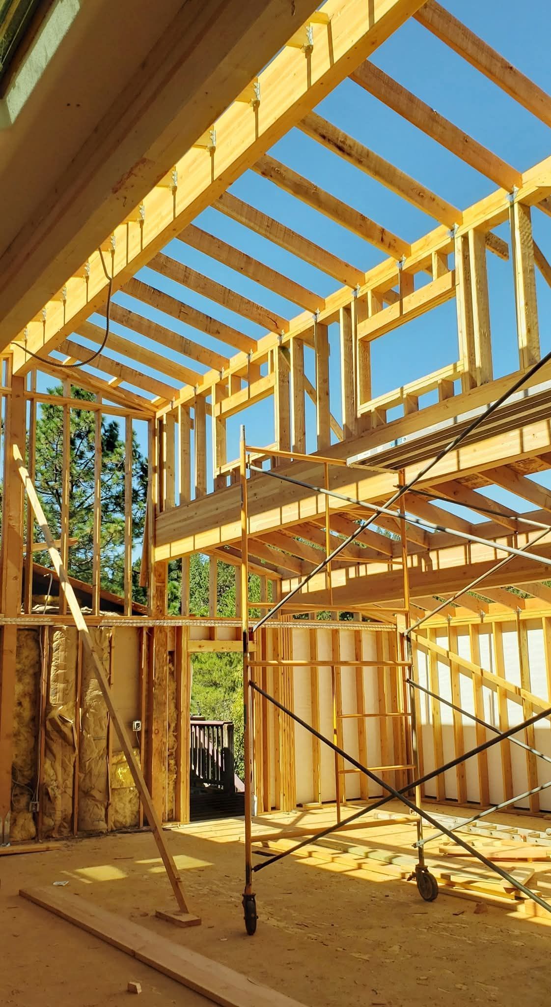 Engineered floor joists framing during a home addition