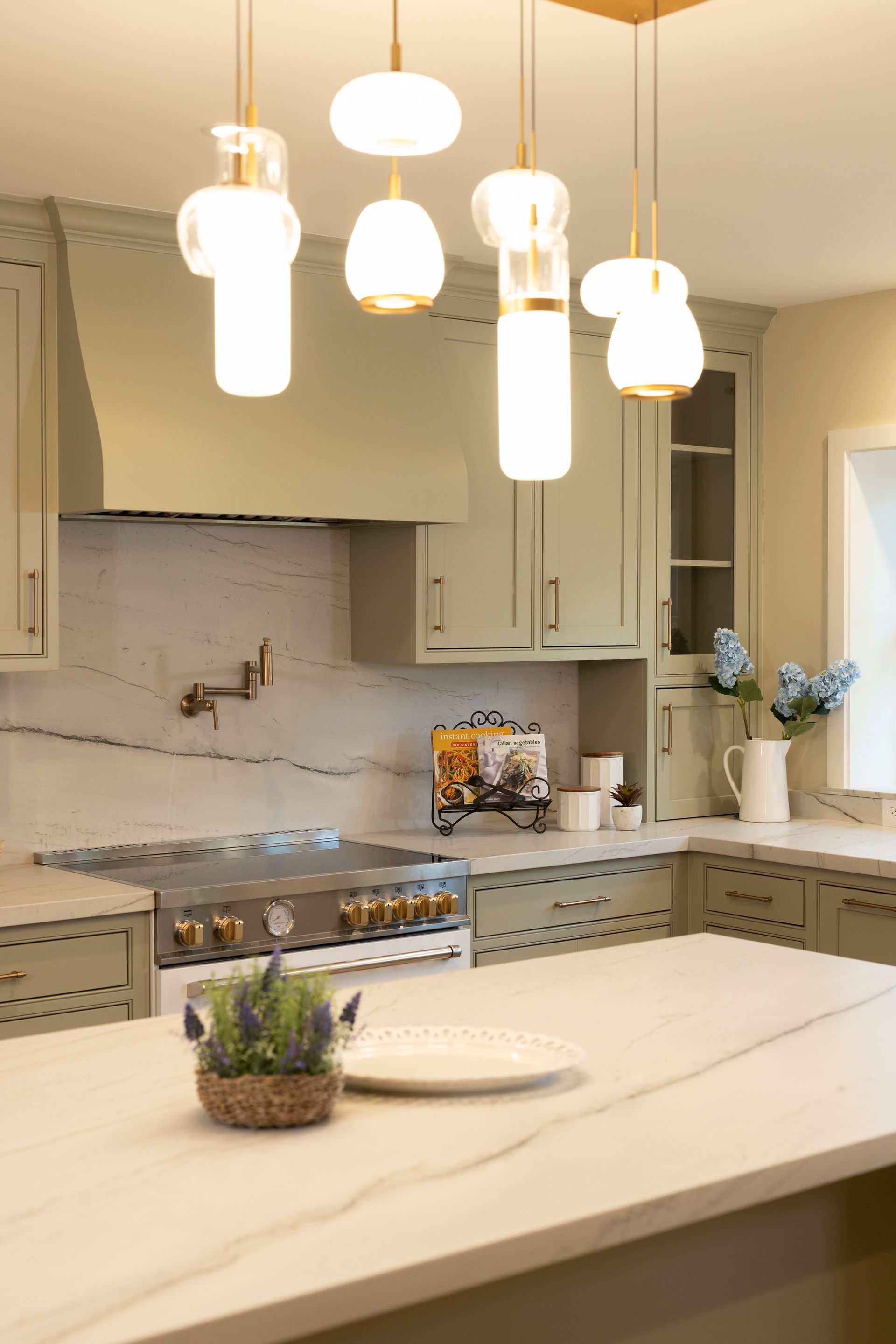 Open dining area with a modern globe pendant light cluster in an Auburn, California home