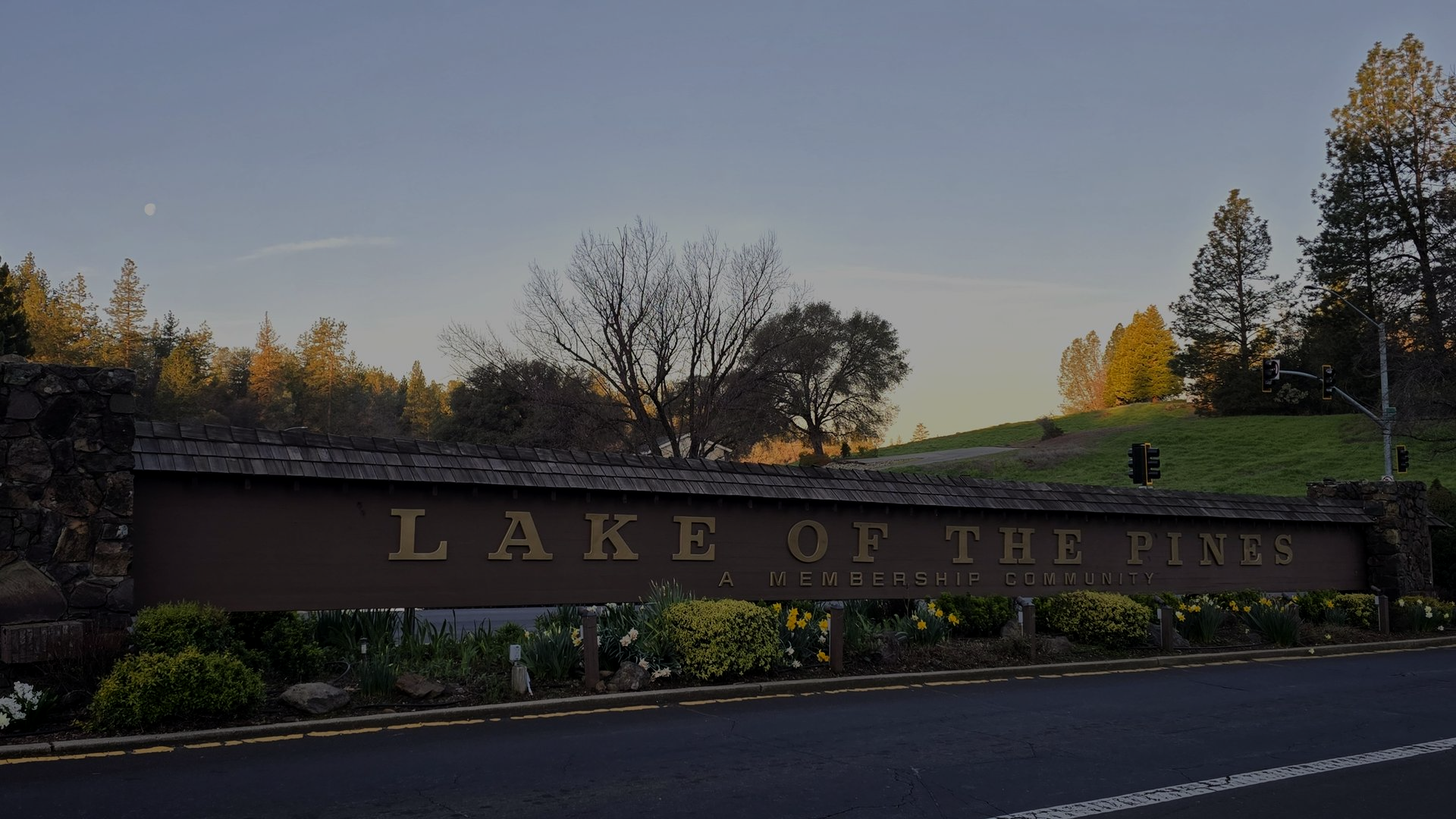 sign at the entrance to Lake of the Pines LOP CA