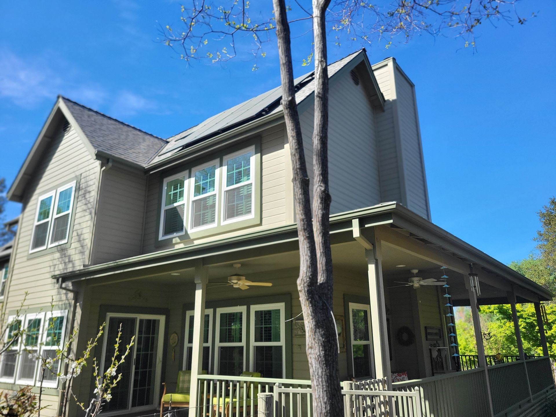 Two-story custom home with a covered porch in Penn Valley, Nevada County