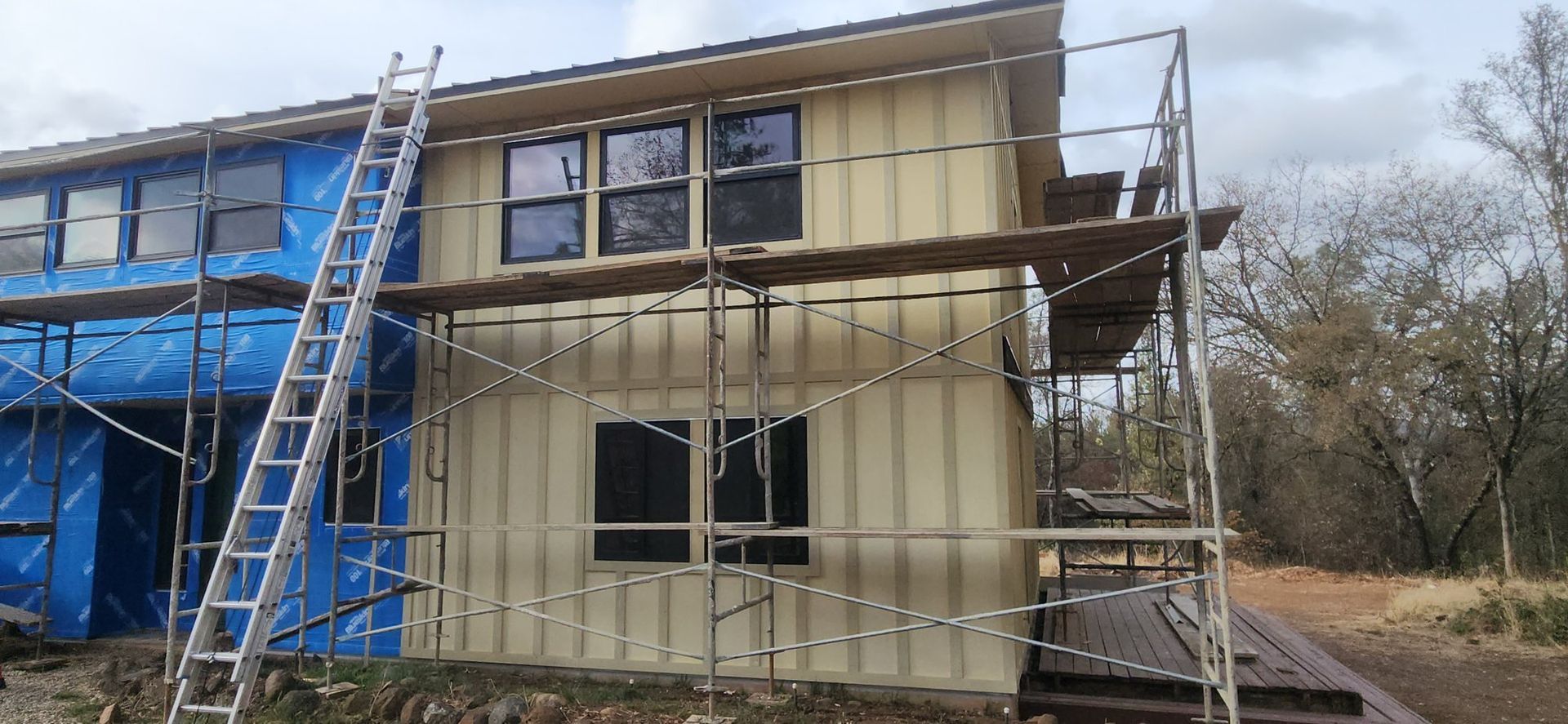 Replacing siding and windows at the same time on a foothill home in Oregon House, Yuba County
